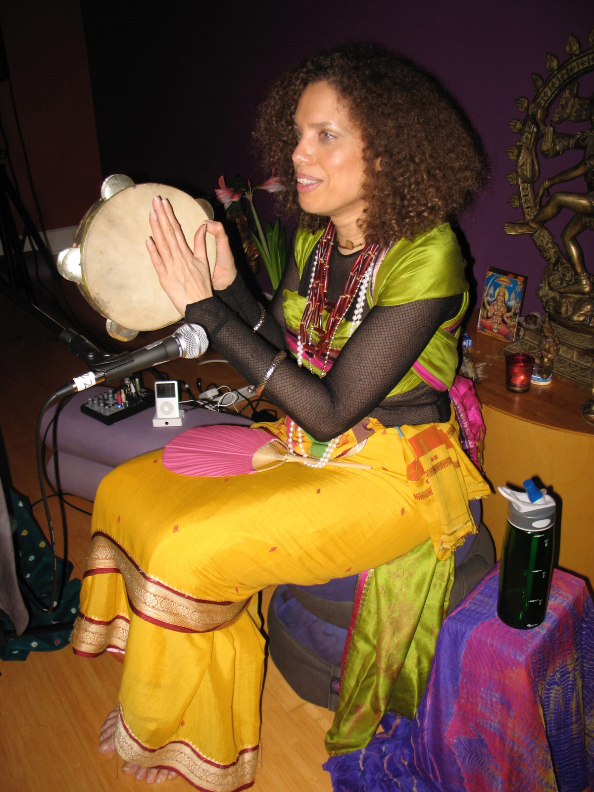 Singer Songwriter Ekayani, creator of Yoga on the Dance Floor, performing at Mystic Yoga Shala after her event at Mystic Independent Theater, photo by Casey Cyr Gash.